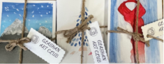 Cards tied with twine and "Glashan Art Club" tags attached